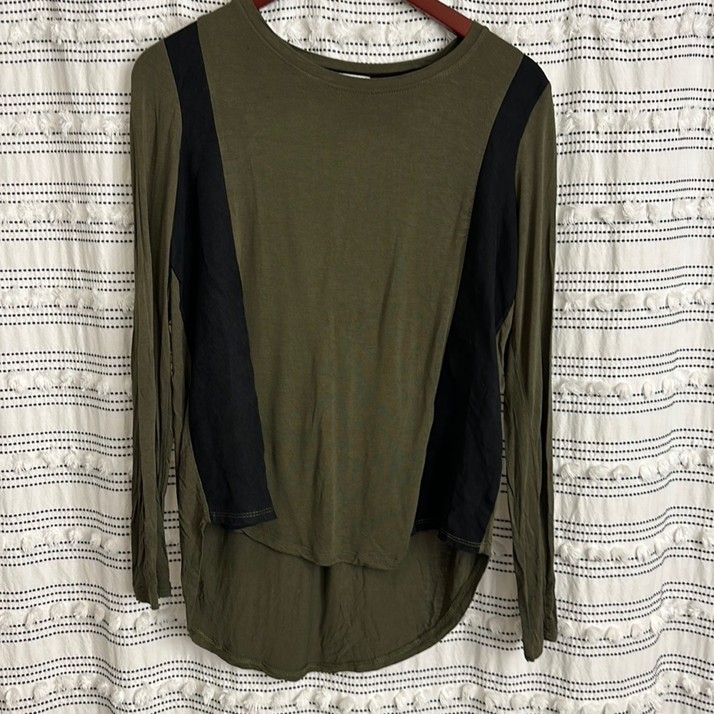 Long sleeve green top with black suede accents